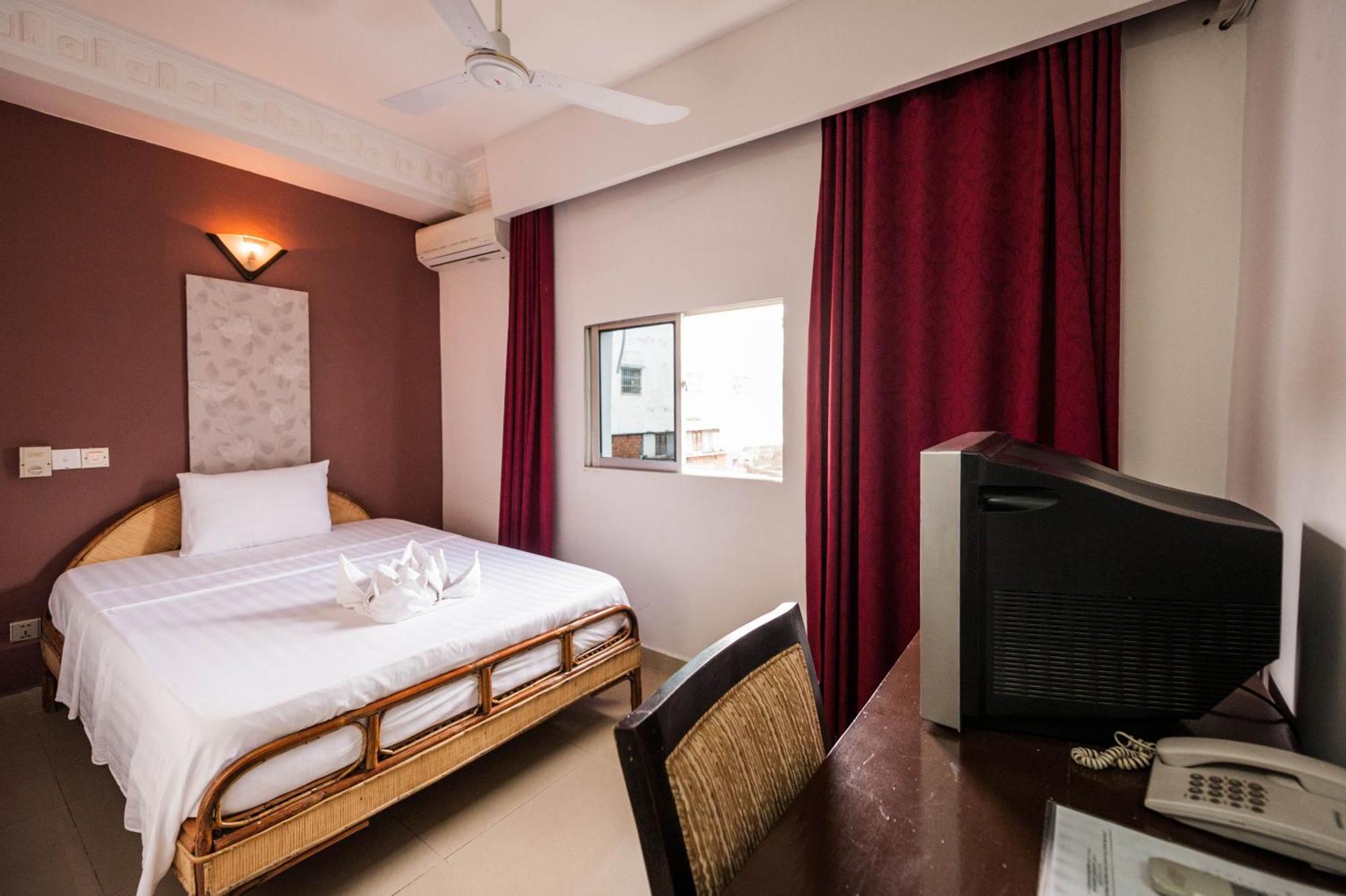 Angkor International Hotel Phnom-Penh Kamer foto